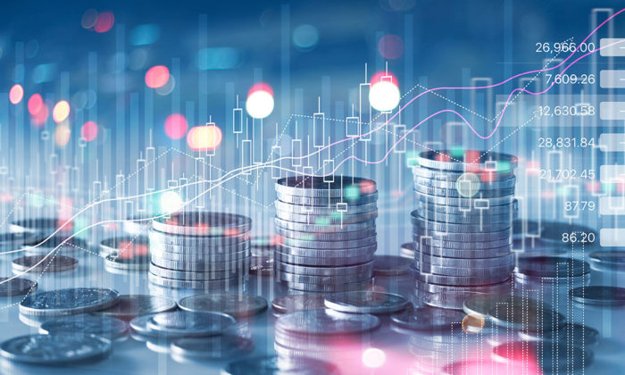 Bild på kronor, grafer och siffror